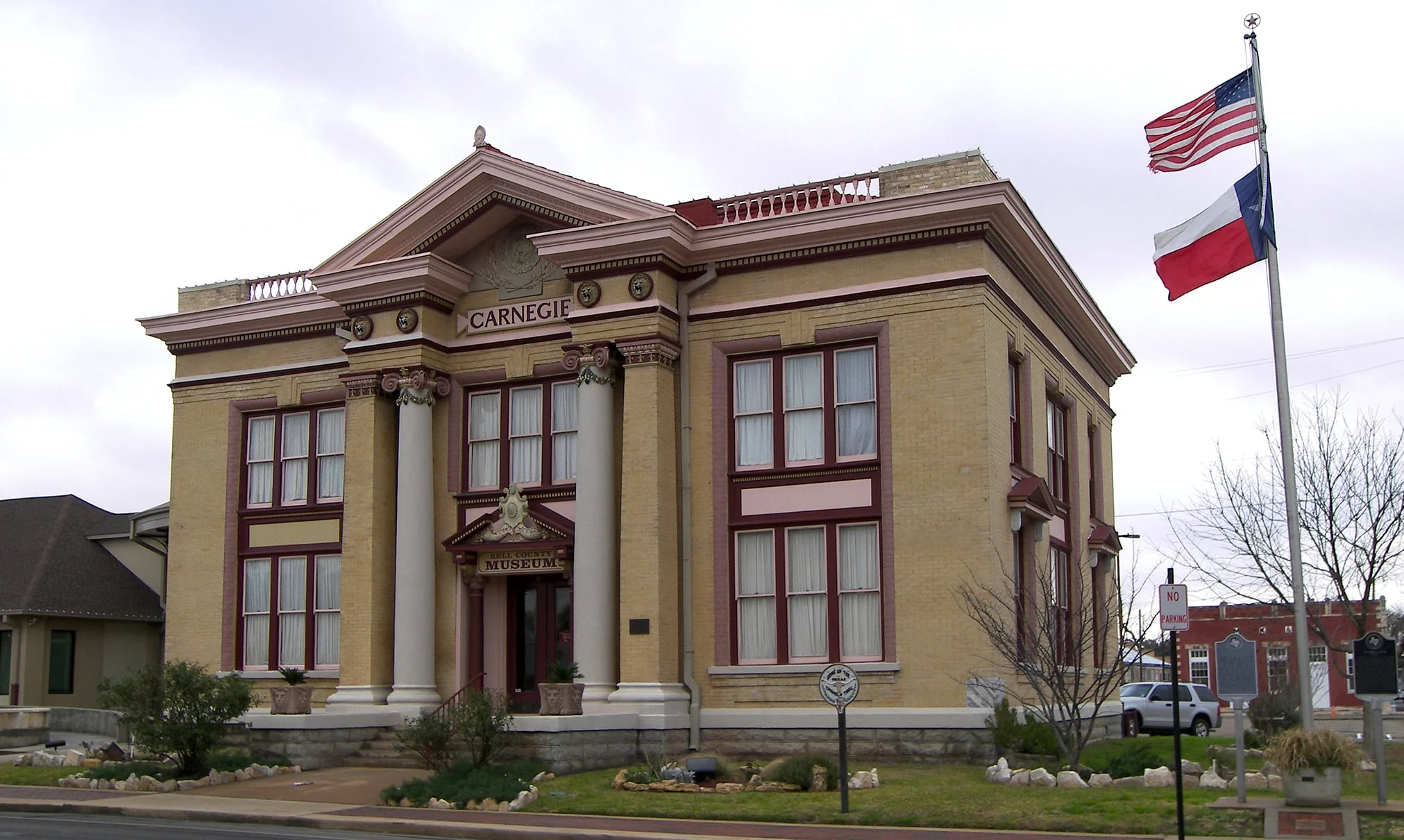 The historic Carnegie Library at the Bell County Museum in Belton, Texas, with its columns and pale brick facade