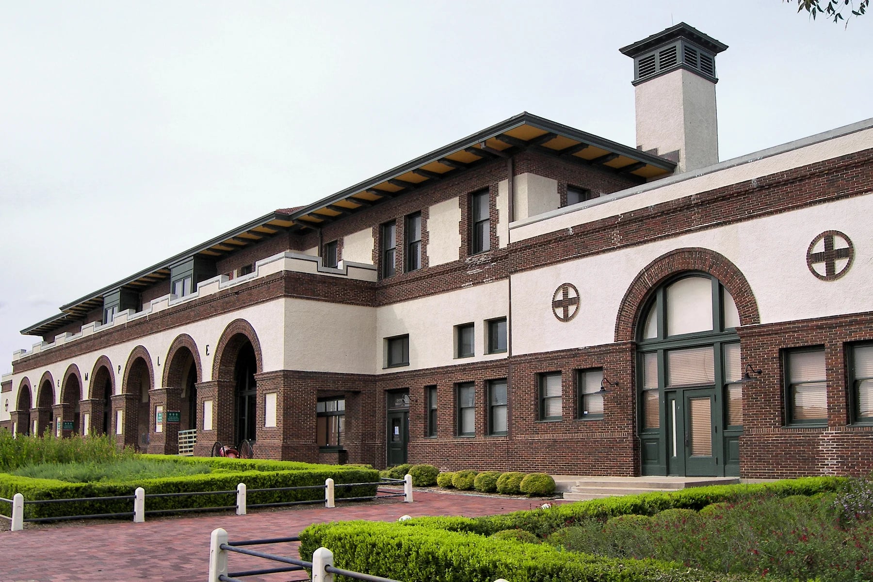 Arched brick facade of the historic Santa Fe Depot and Railroad and Heritage Museum in Temple, Texas